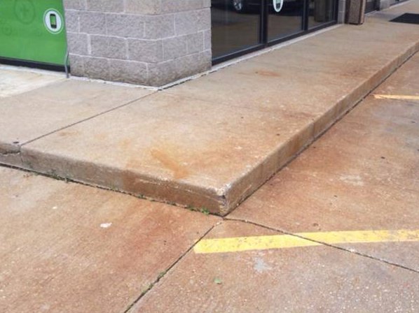 Concrete parking area before